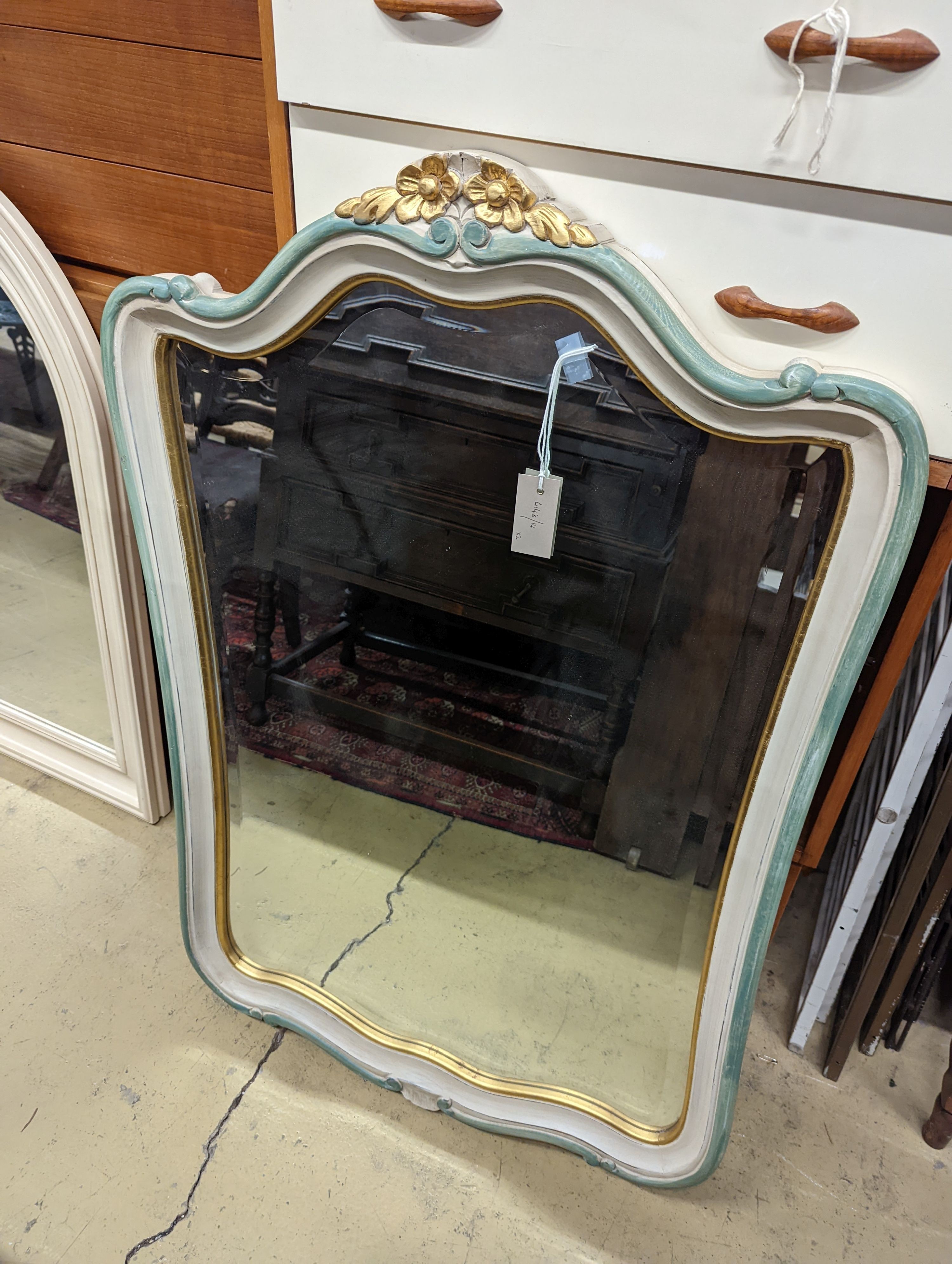 Two modern cream painted wall mirrors, larger width 69cm, height 106cm